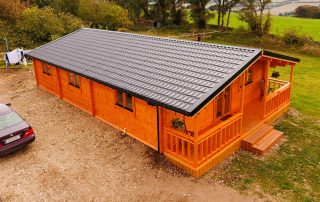Loghouse.ie log cabin. Top quality log house products.