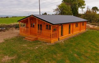 Loghouse.ie log cabin. Top quality log house products.